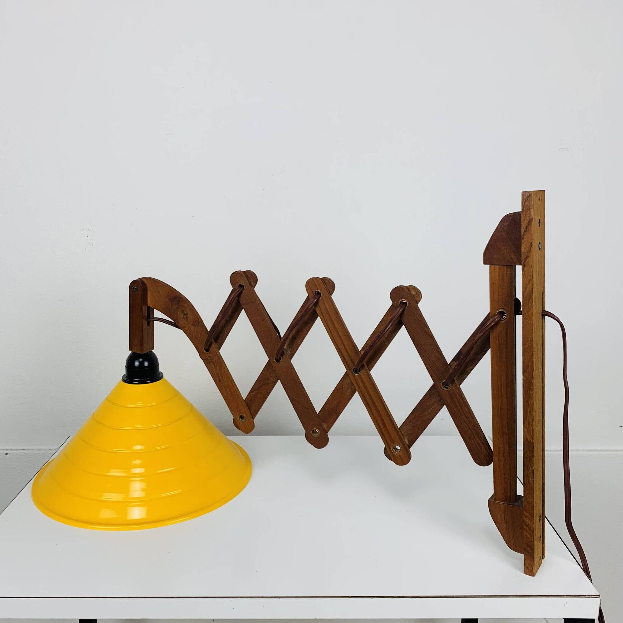 Scandinavian accordion wall light from the 60s, wood and yellow reflector