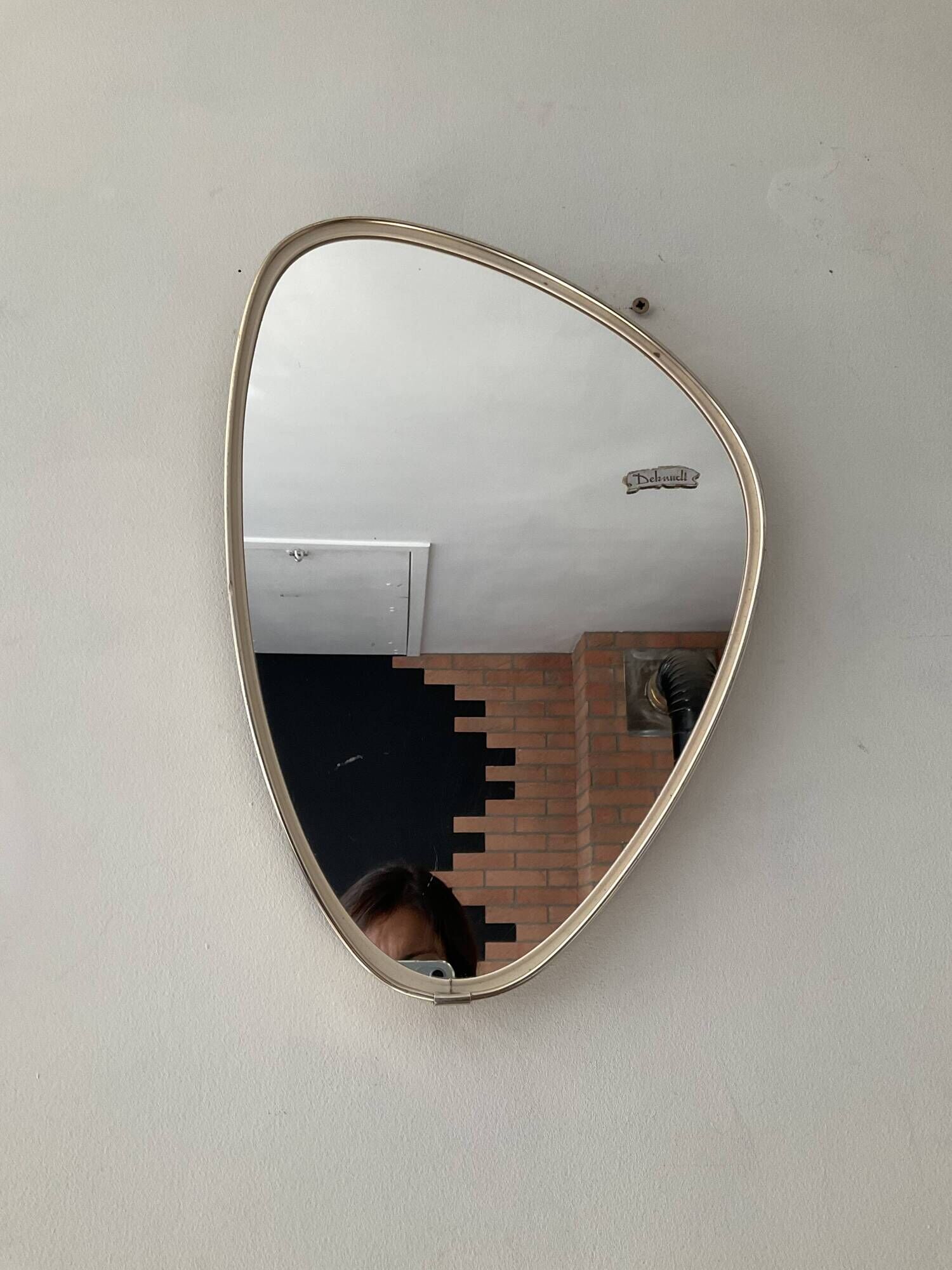 Asymmetrical mirror Deknudt freeform from the 60s-70s