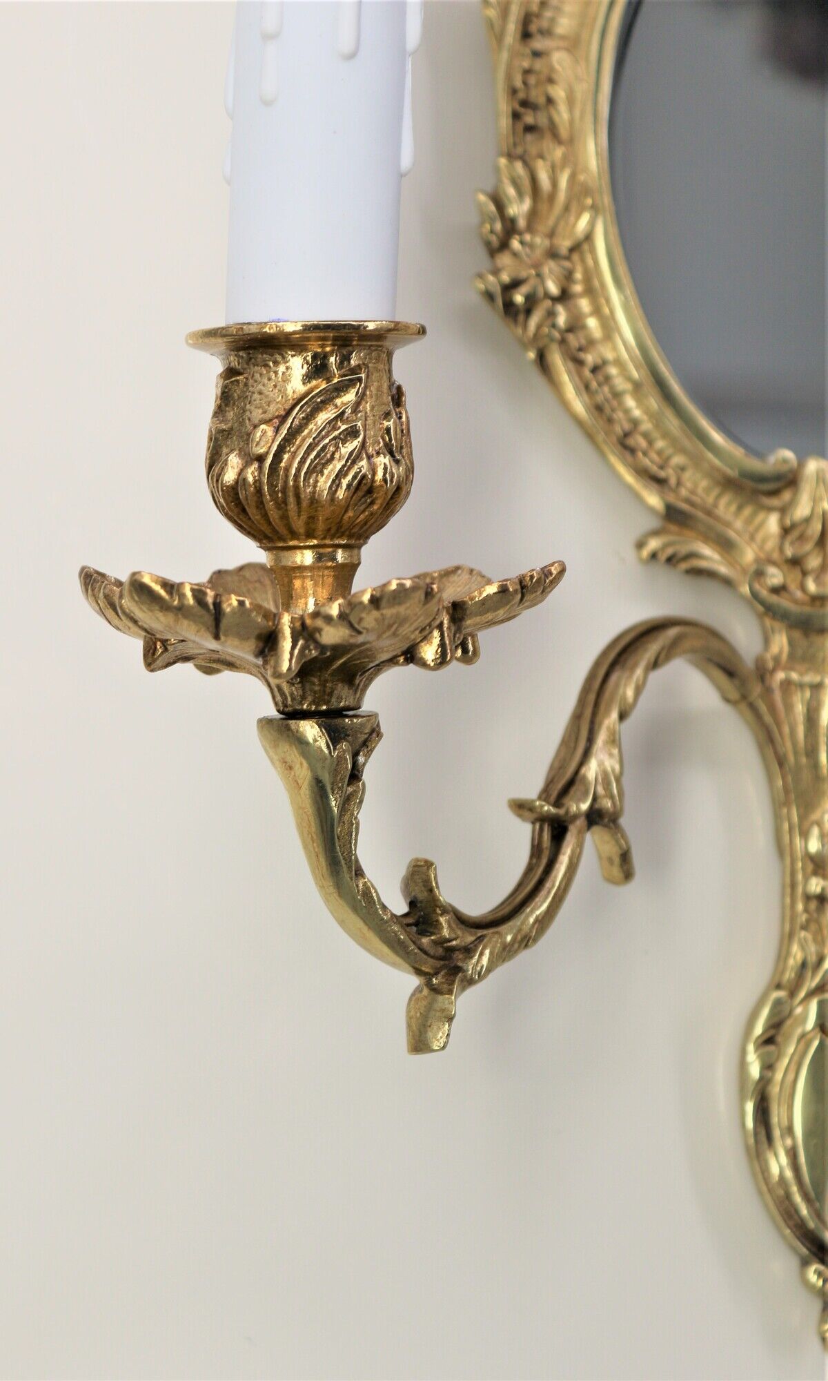 Pair of louis XV beveled mirror wall lamps in bronze by "Lucien Gau"