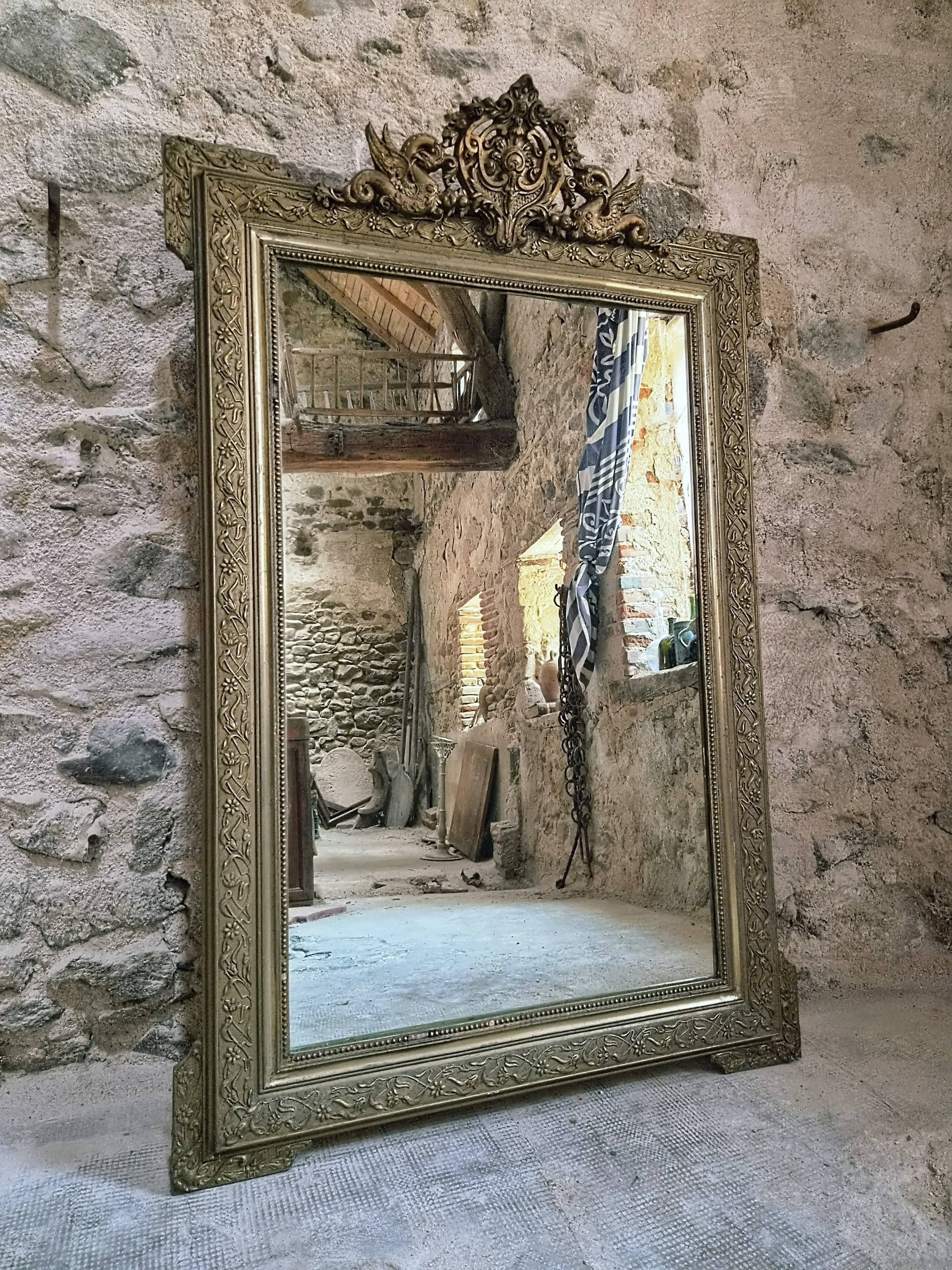 Large French mirror in Napoléon III style with a composition frame, circa 1880–1900.