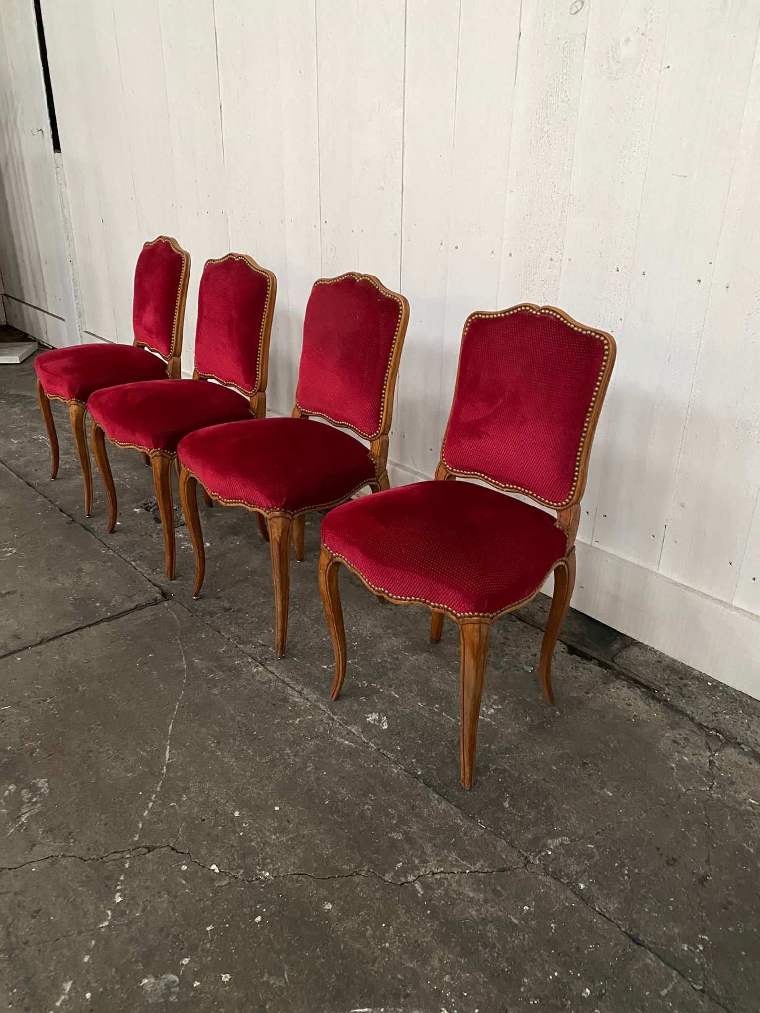 4 red Louis XV style chairs