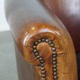 Fauteuil club en cuir de mouton couleur cognac