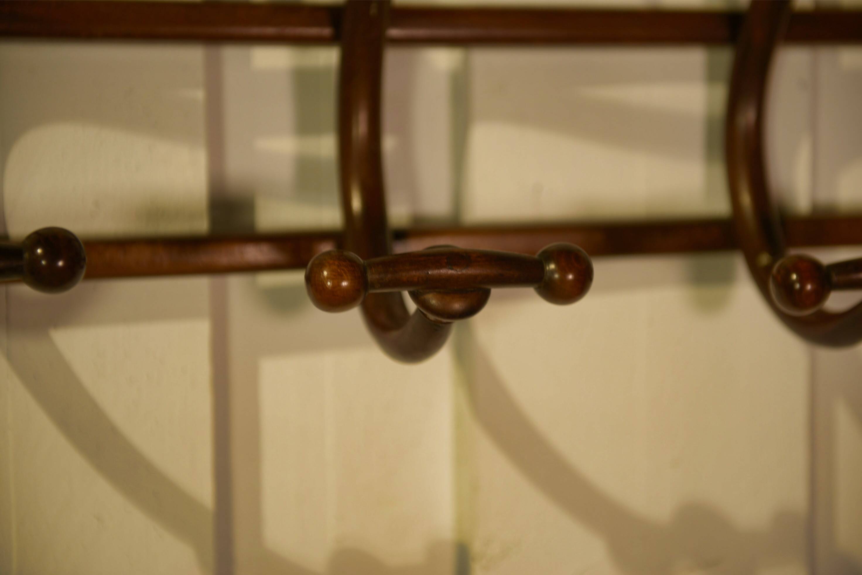 Curved beech wall coat rack published by Thonet, 1930s.