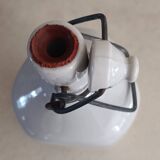 Stoneware bottle with cut sides
