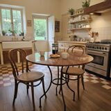 Round marble table with wrought iron base from the mid-20th century.