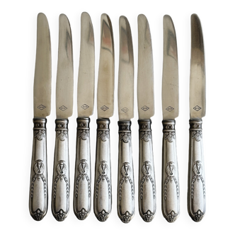 Set of 8 silver metal knives