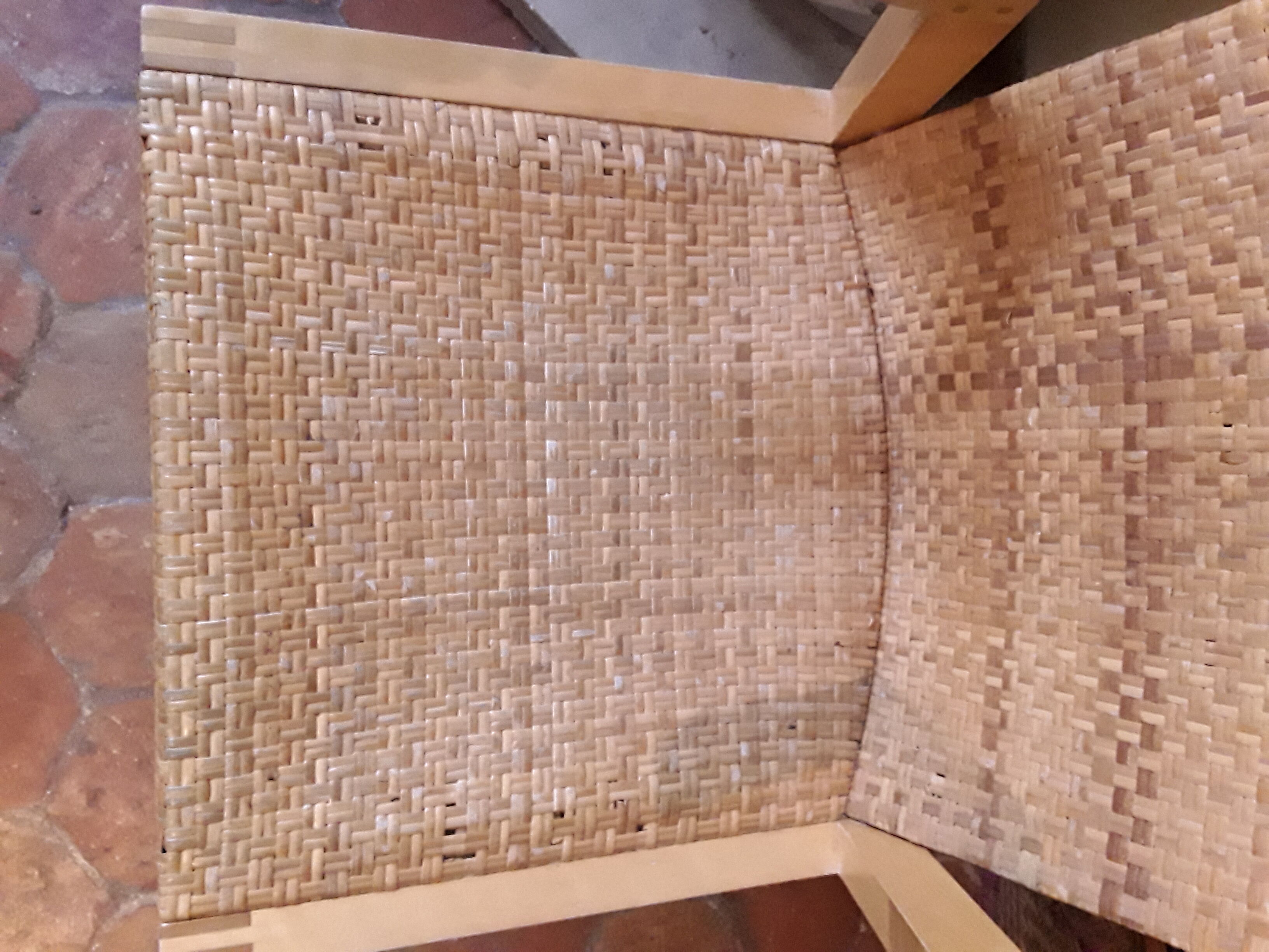 Two vintage braided straw armchairs