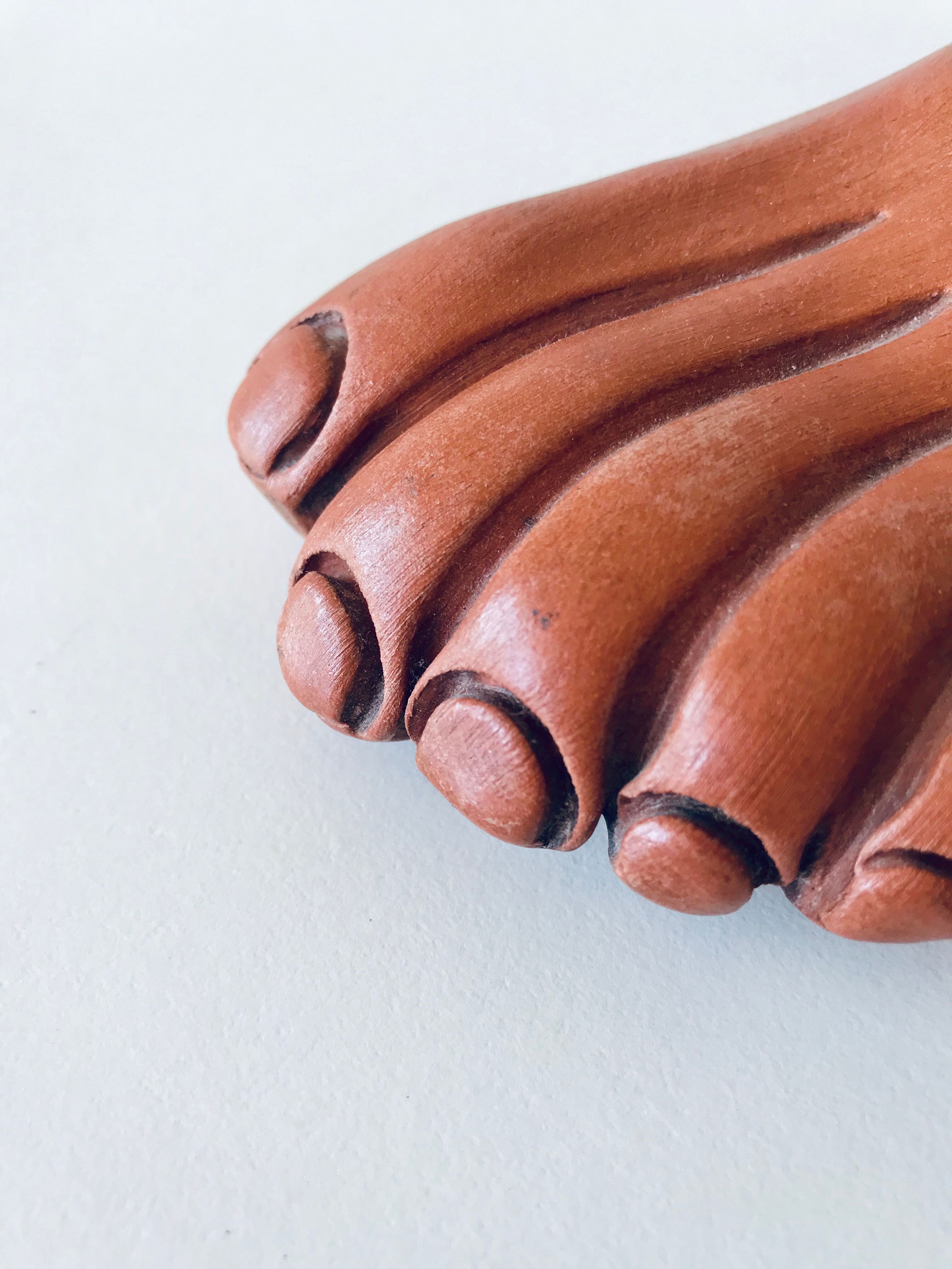 Foot ashtray signed Jean Marais