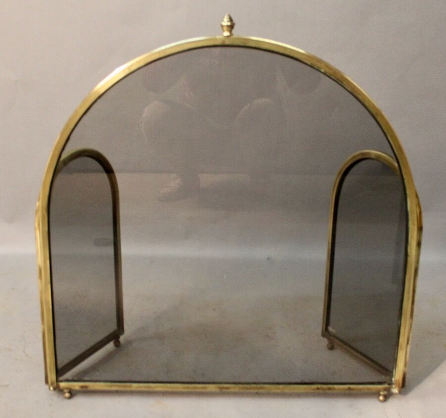 Brass fire screen tinted windows