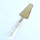 Vintage pie shovel by Streisguth in stainless steel and pearly resin handle