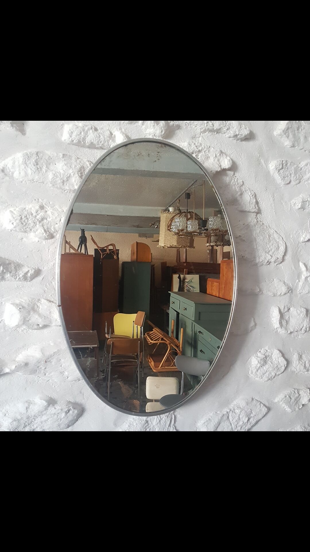 Old aluminum oval mirror