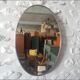 Old aluminum oval mirror