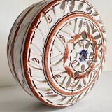 Handmade terracotta wall lamp with blue enamelled center