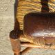 old armchair with leather armrests, from the 19th century