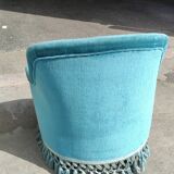 Blue velvet upholstered toad armchair