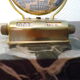 Perpetual calendar on marble base with marble patinated regulated decoration, 60s