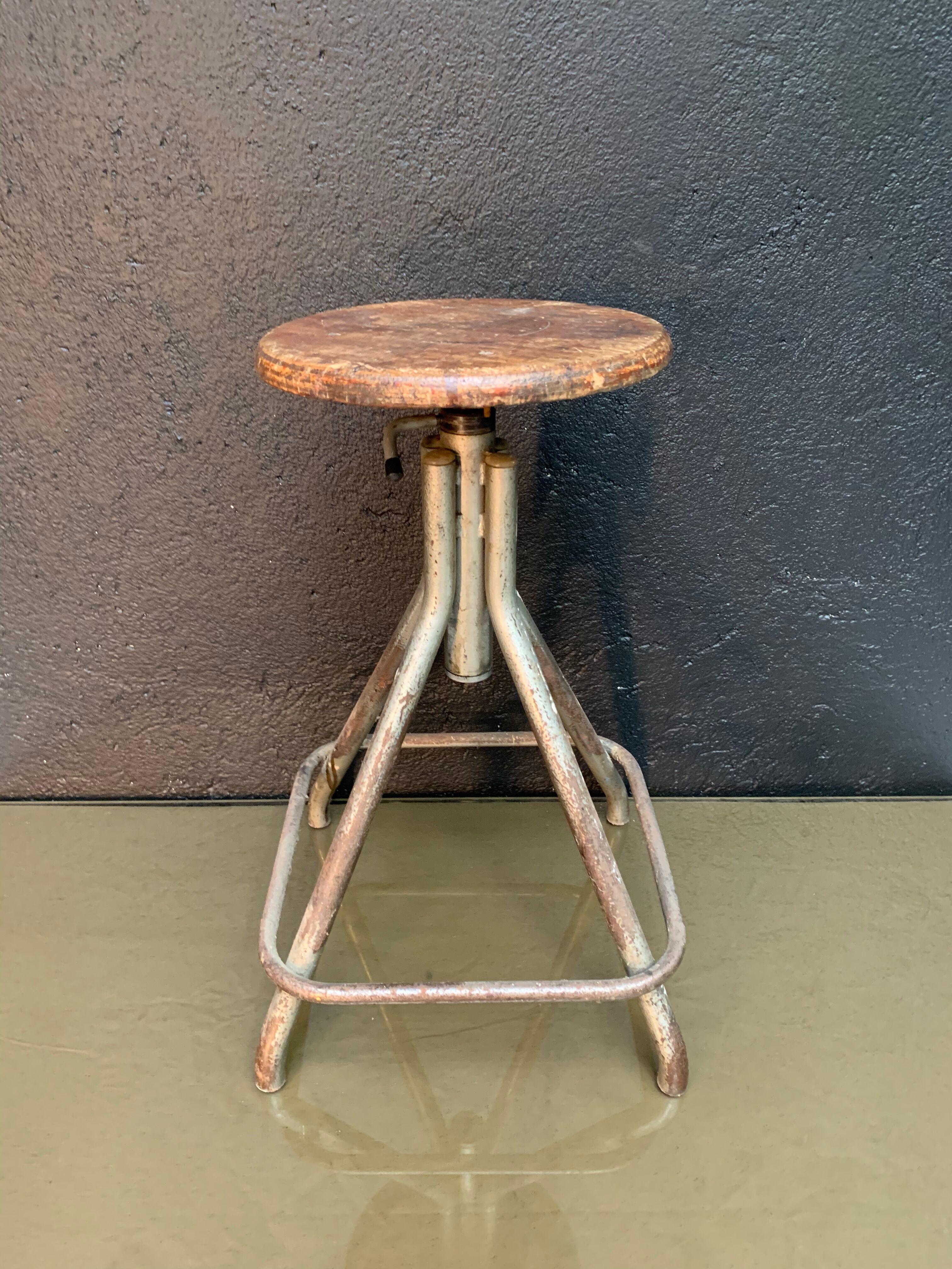 Old adjustable workshop stool