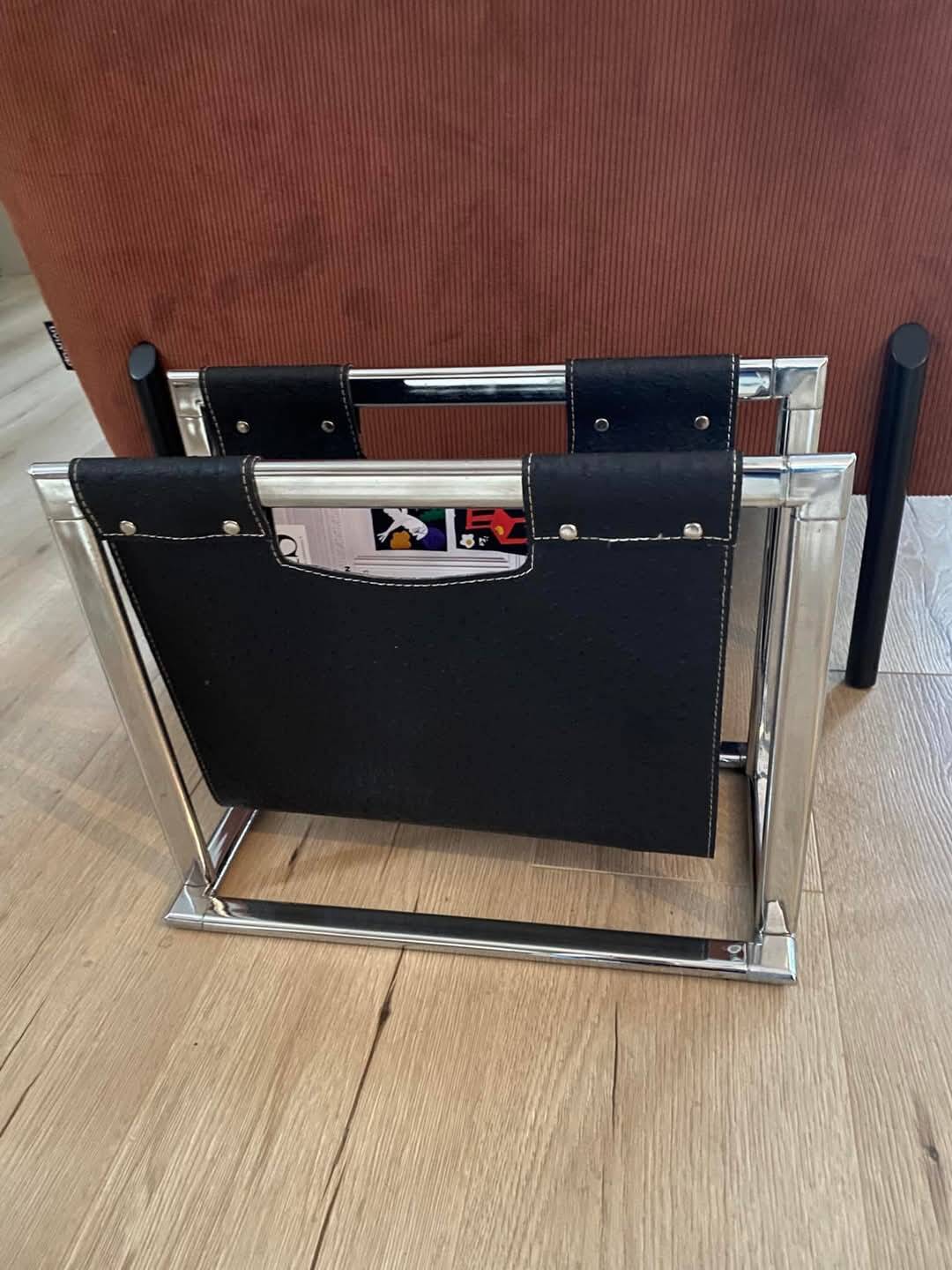 Chrome metal and leather magazine rack