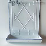 Old enamelled kitchen utensil display