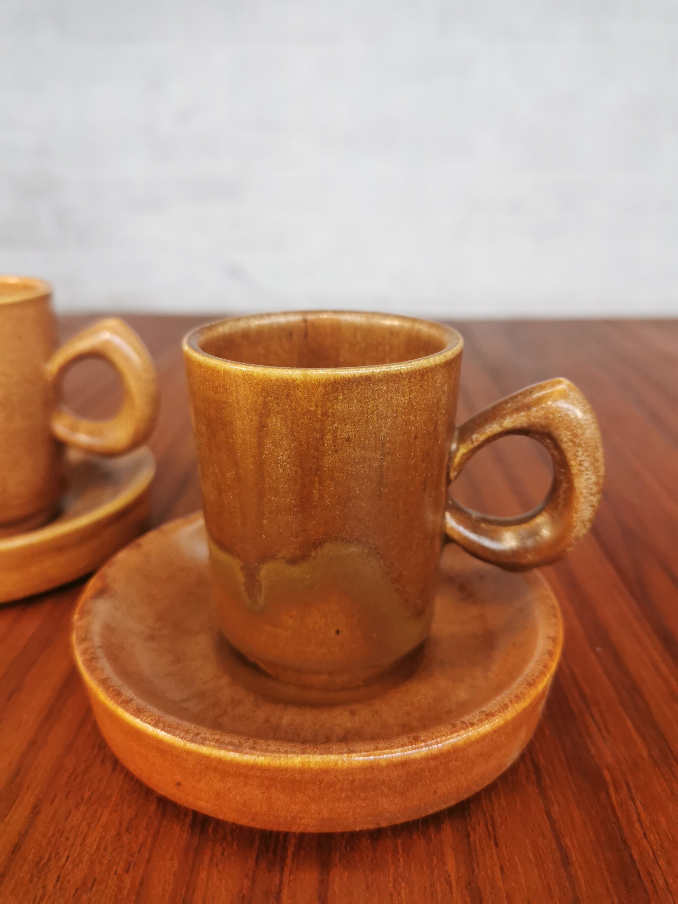 Duo of vintage stoneware cups