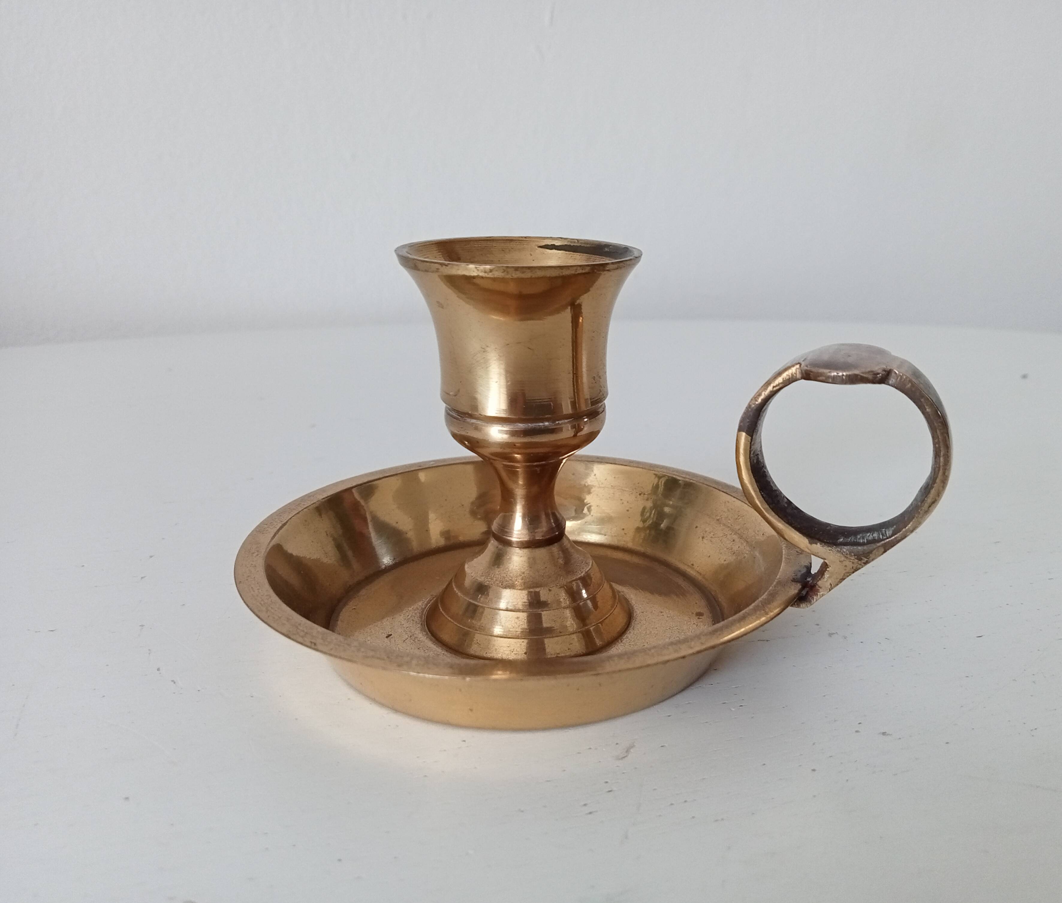 Vintage hand candle holder in solid golden brass
