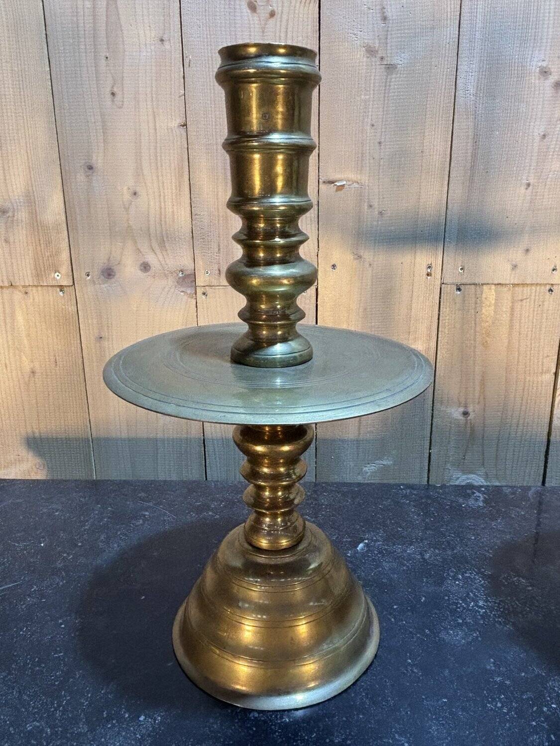 Pair of important brass candle holders