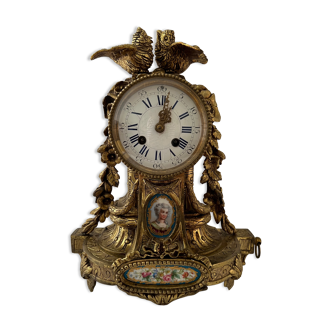 Decorative clock in gilded brass