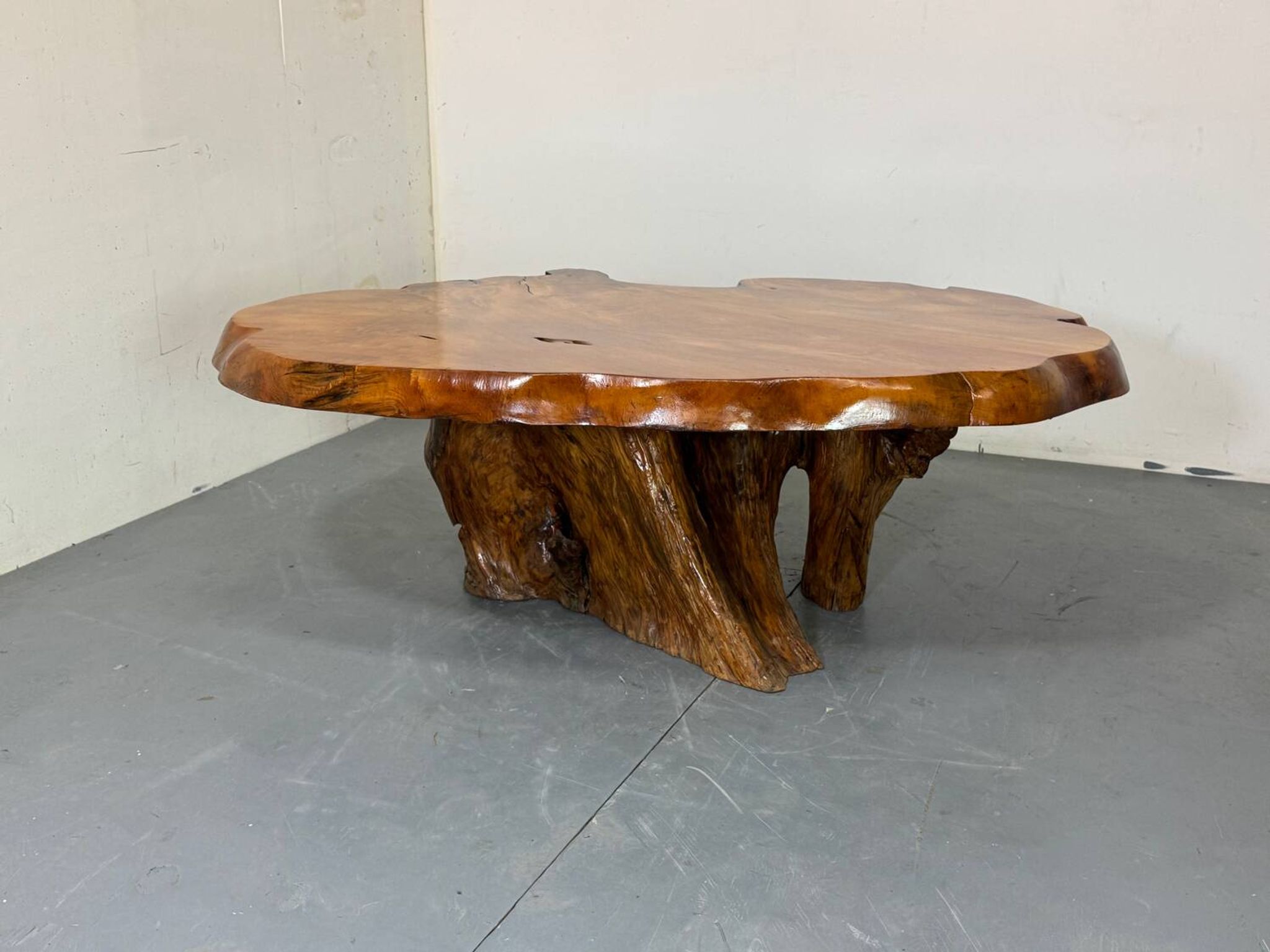 Brutalist Wabi Sabi mid-century coffee table made of natural biological burl wood.