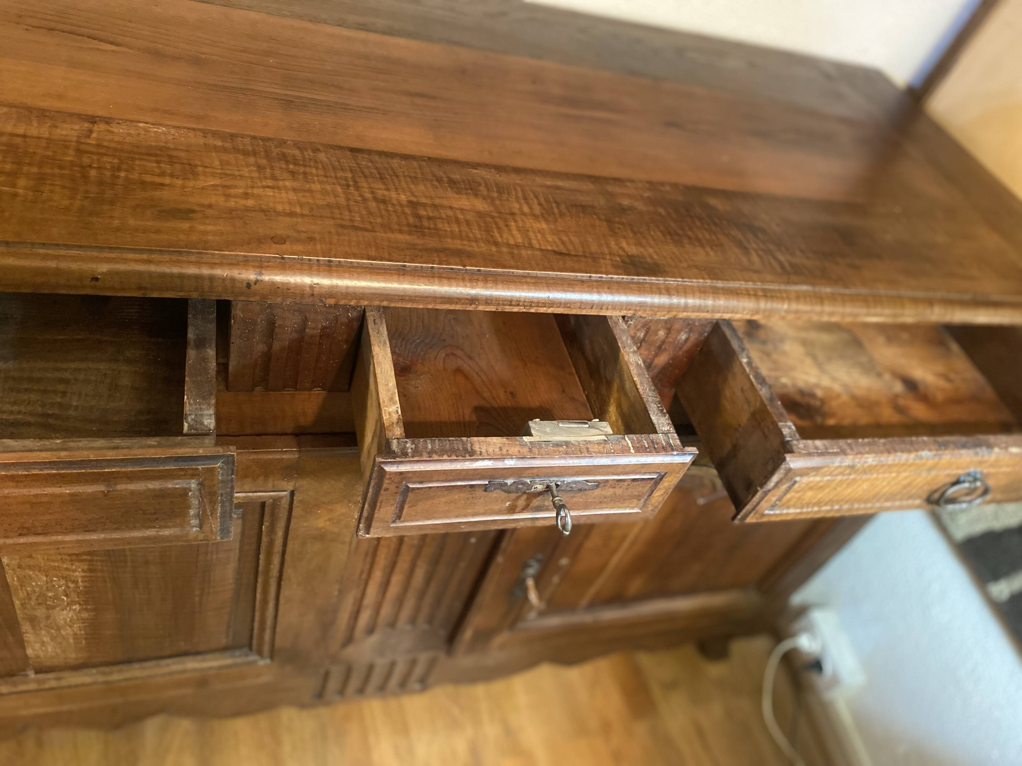 Important Louis XV style walnut sideboard.
