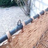 Rattan and steel shelf