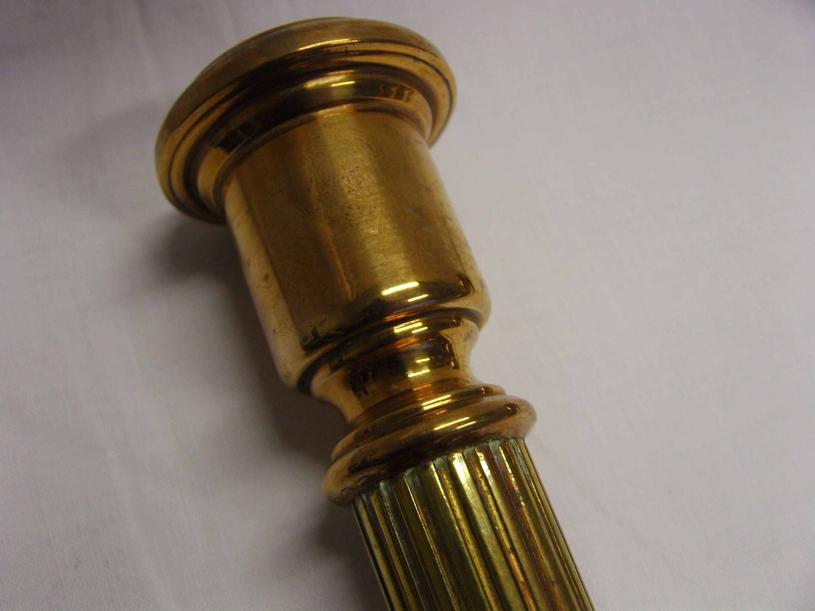 Pair of fluted brass candlesticks Louis XVI style