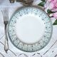 Mismatched antique flat plates made of ironstone accompanied by