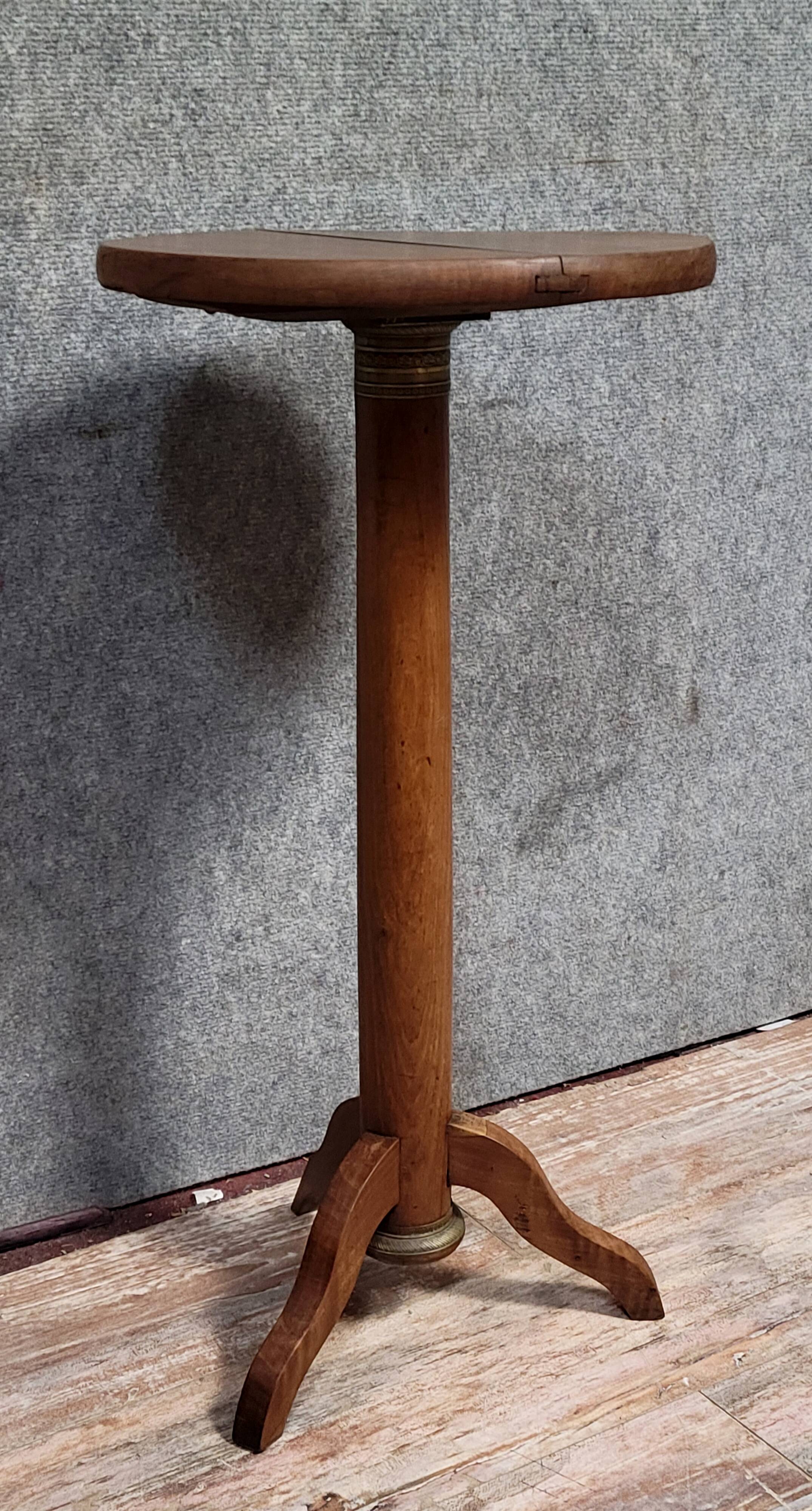 Empire period pedestal table in solid wood and gilt bronze