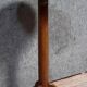 Empire period pedestal table in solid wood and gilt bronze