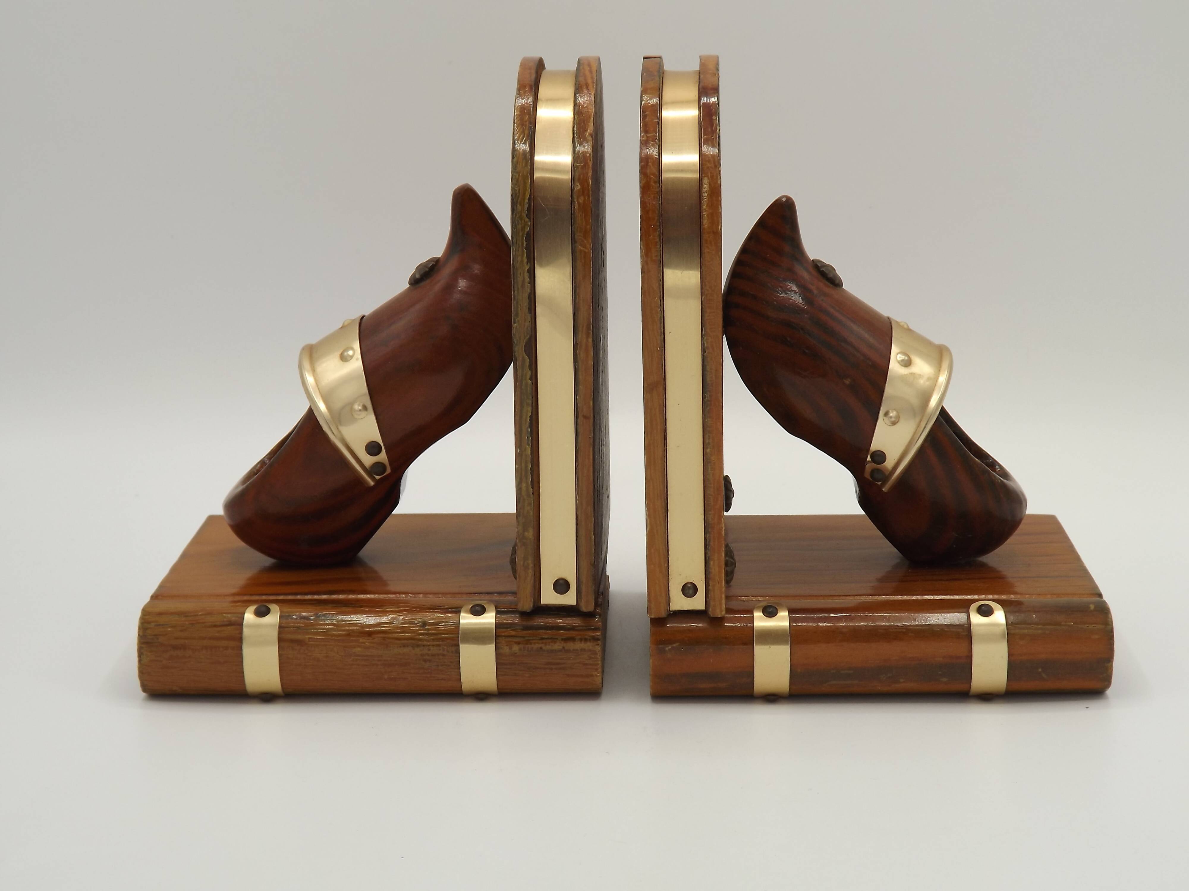 Vintage French Breton wooden bookends hand-carved with book and clog motif.