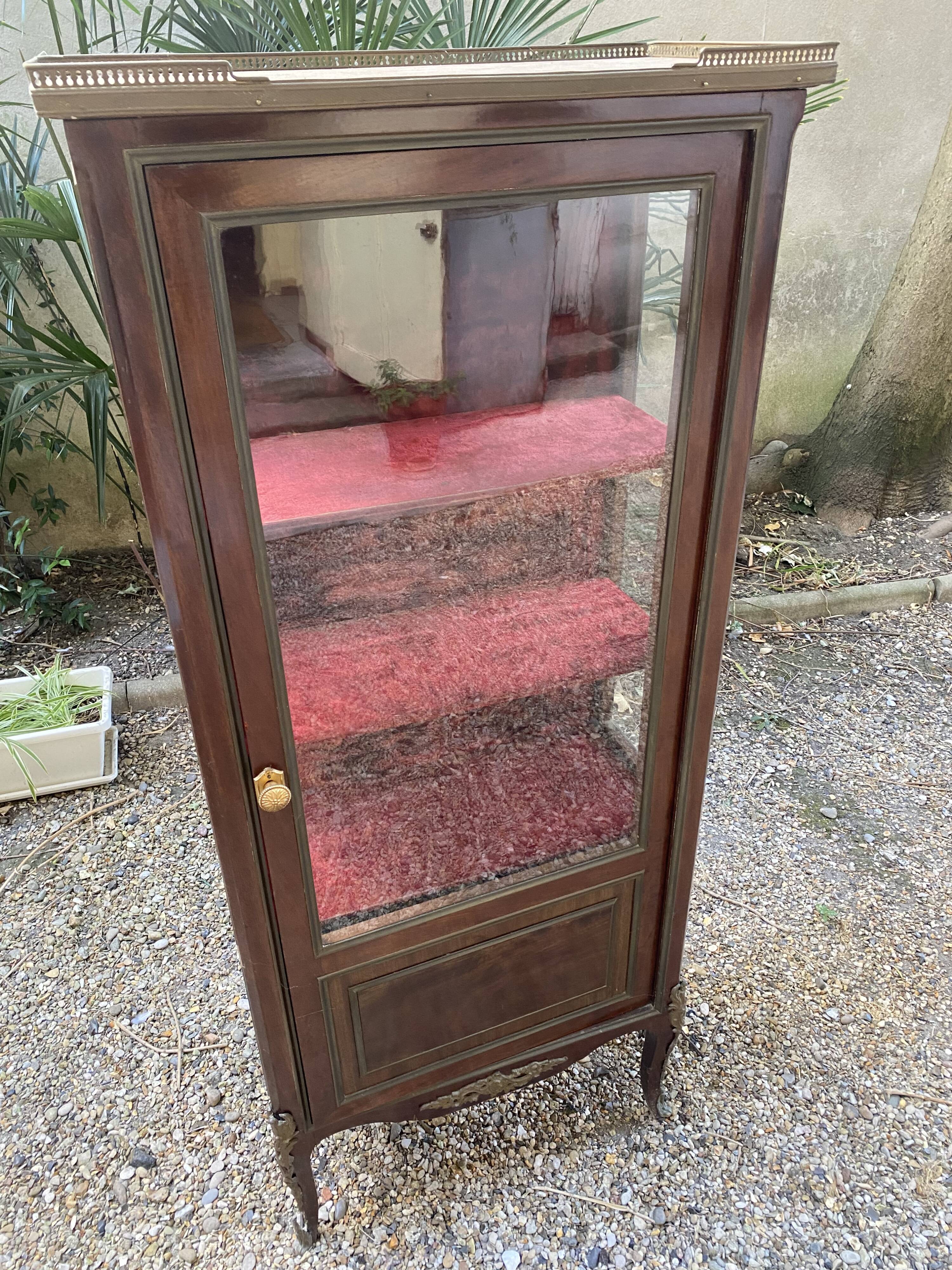 19th/20th century mahogany display cabinet, marble top and glass sides.