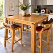 Table haute en bois massif extensible + 4 tabourets