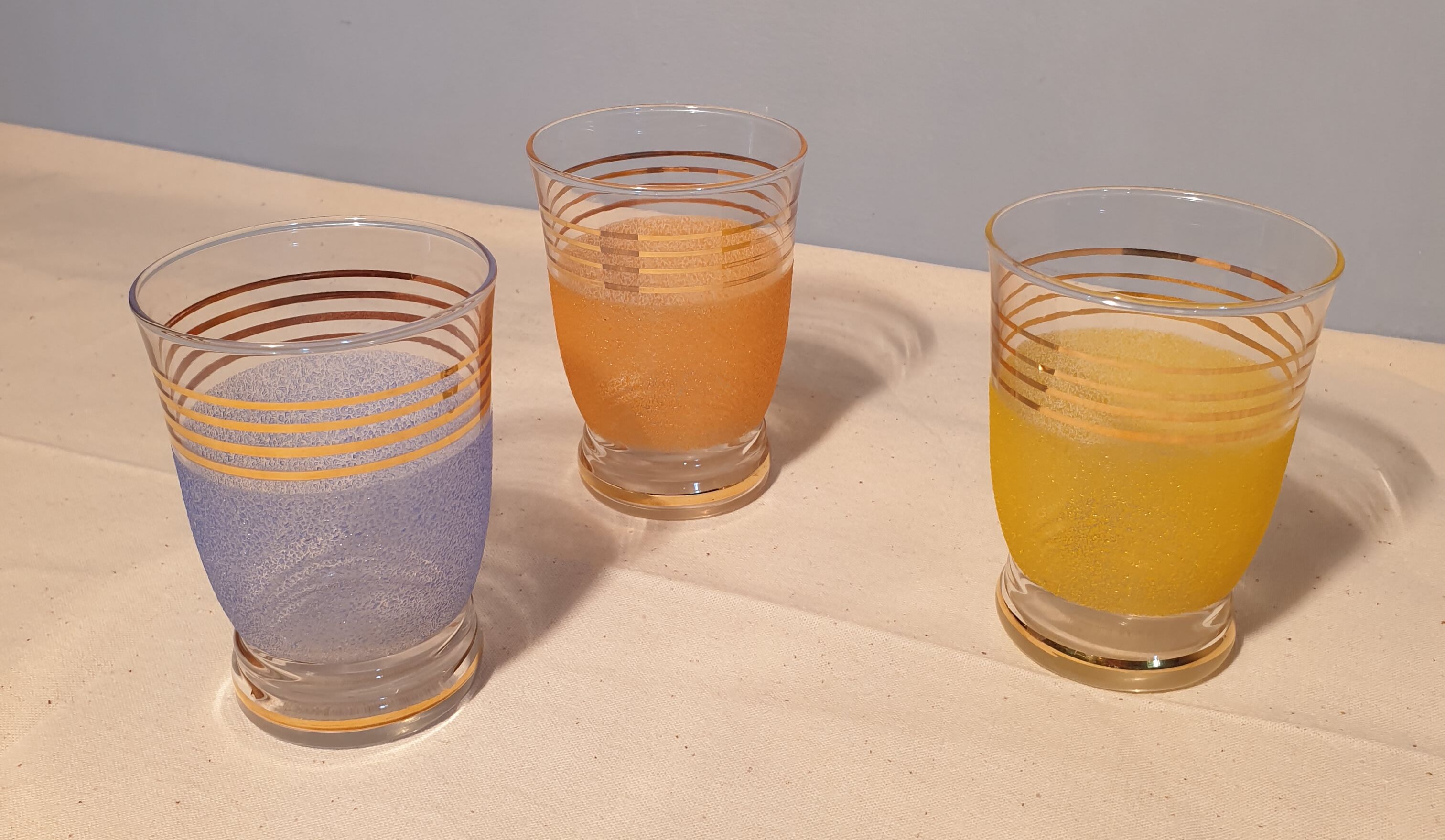Three granite water glasses