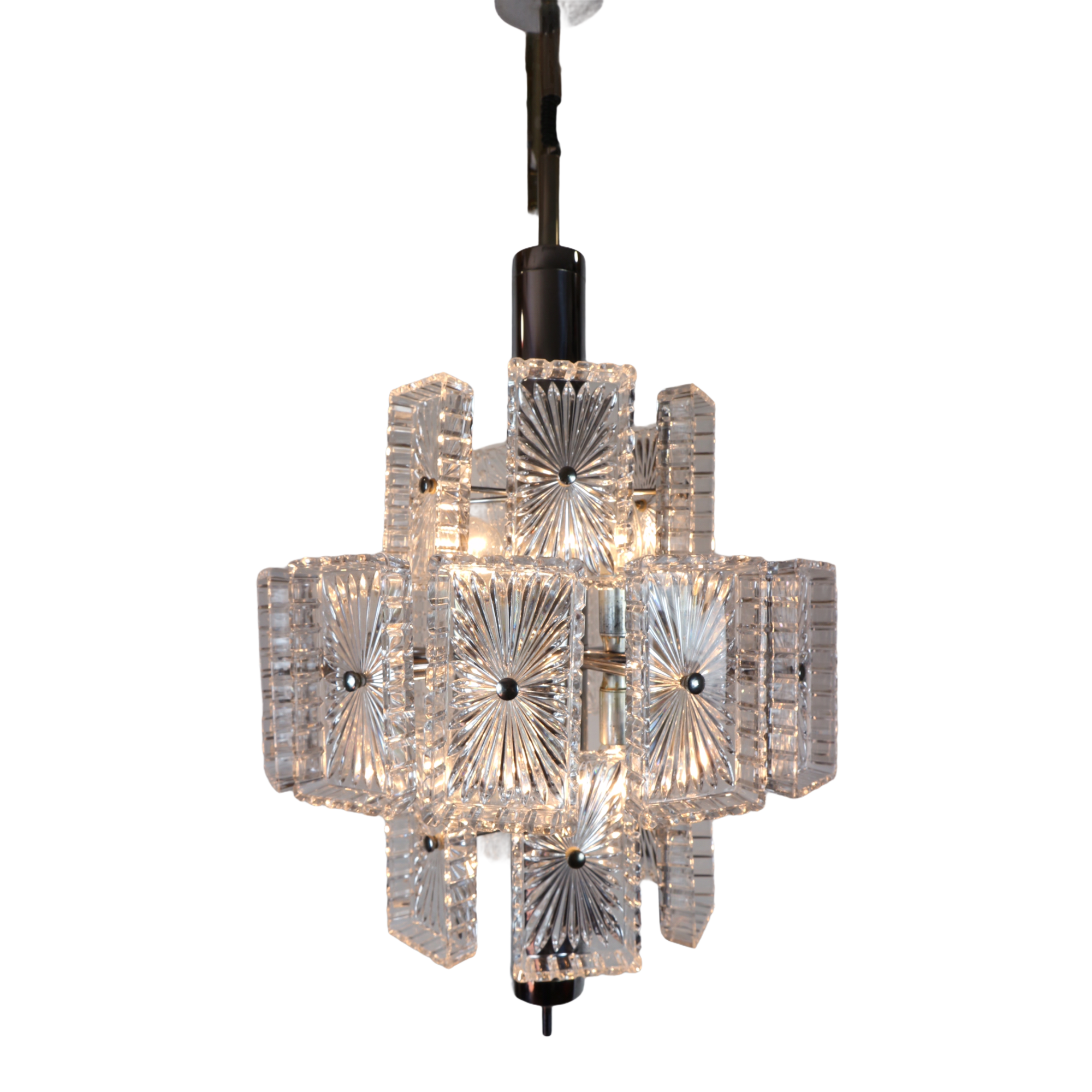 Vintage metal chandelier and carved glass