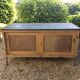 Antique workshop cabinet with sliding doors