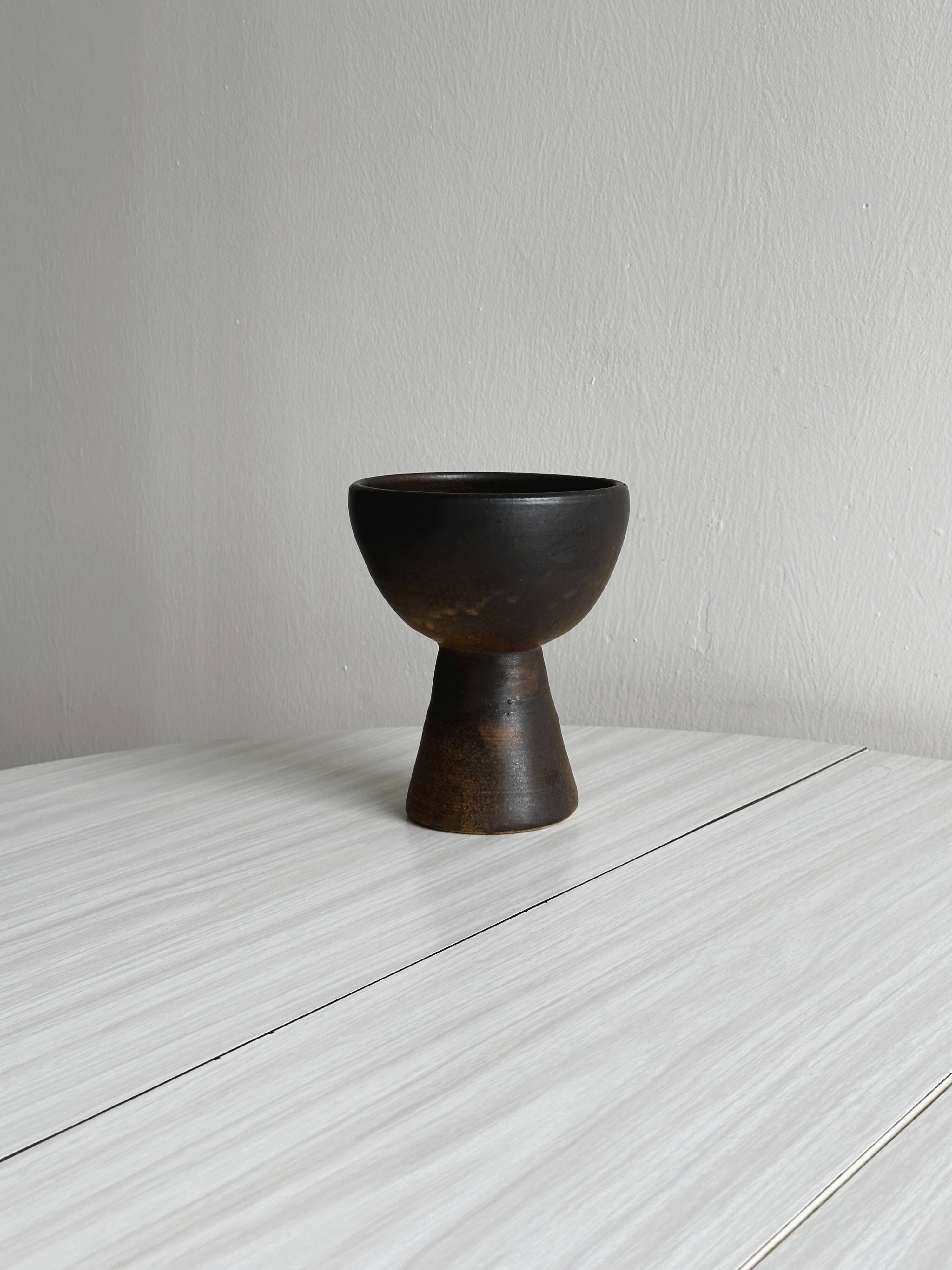 Dark brown raw ceramic cup