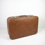 Cardboard and brown leather case