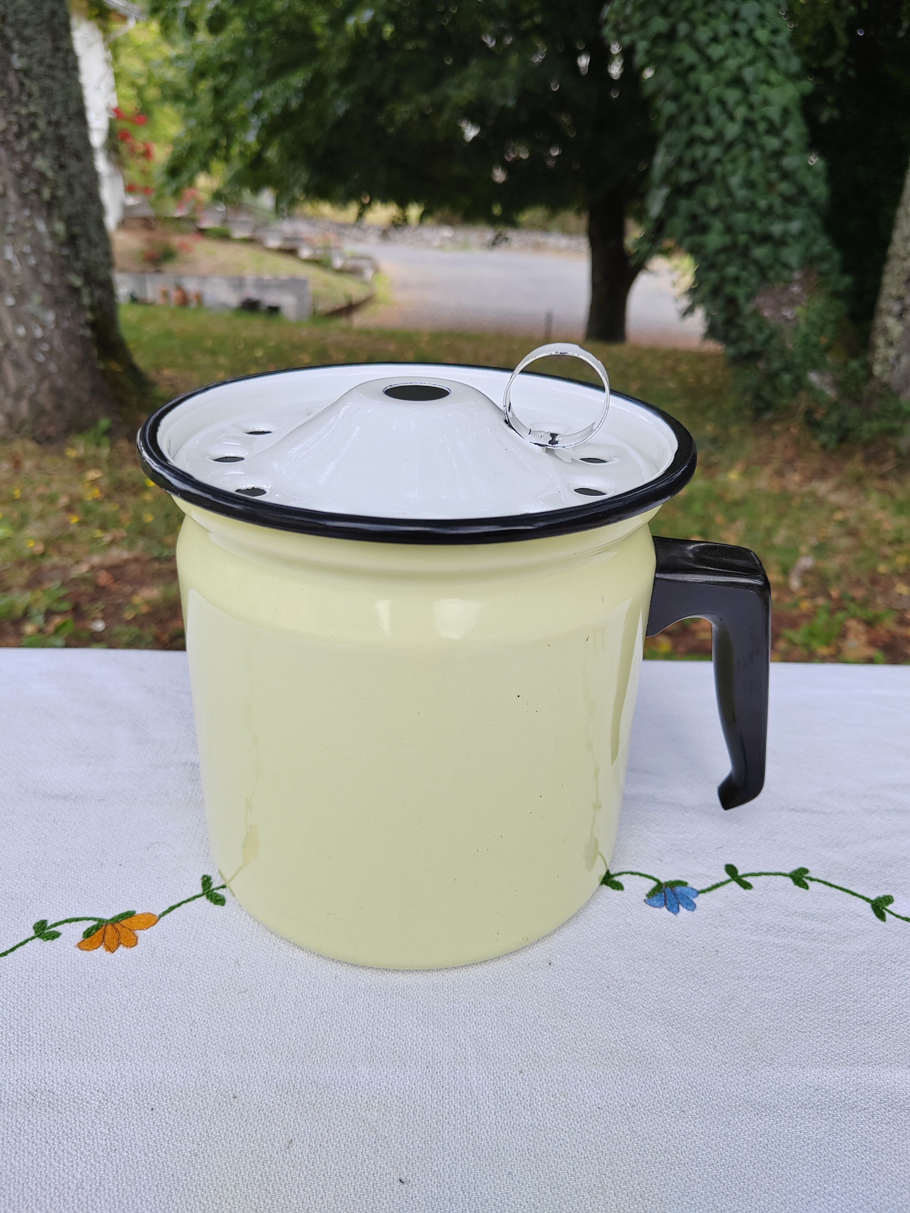 Yellow enamelled milk kettle