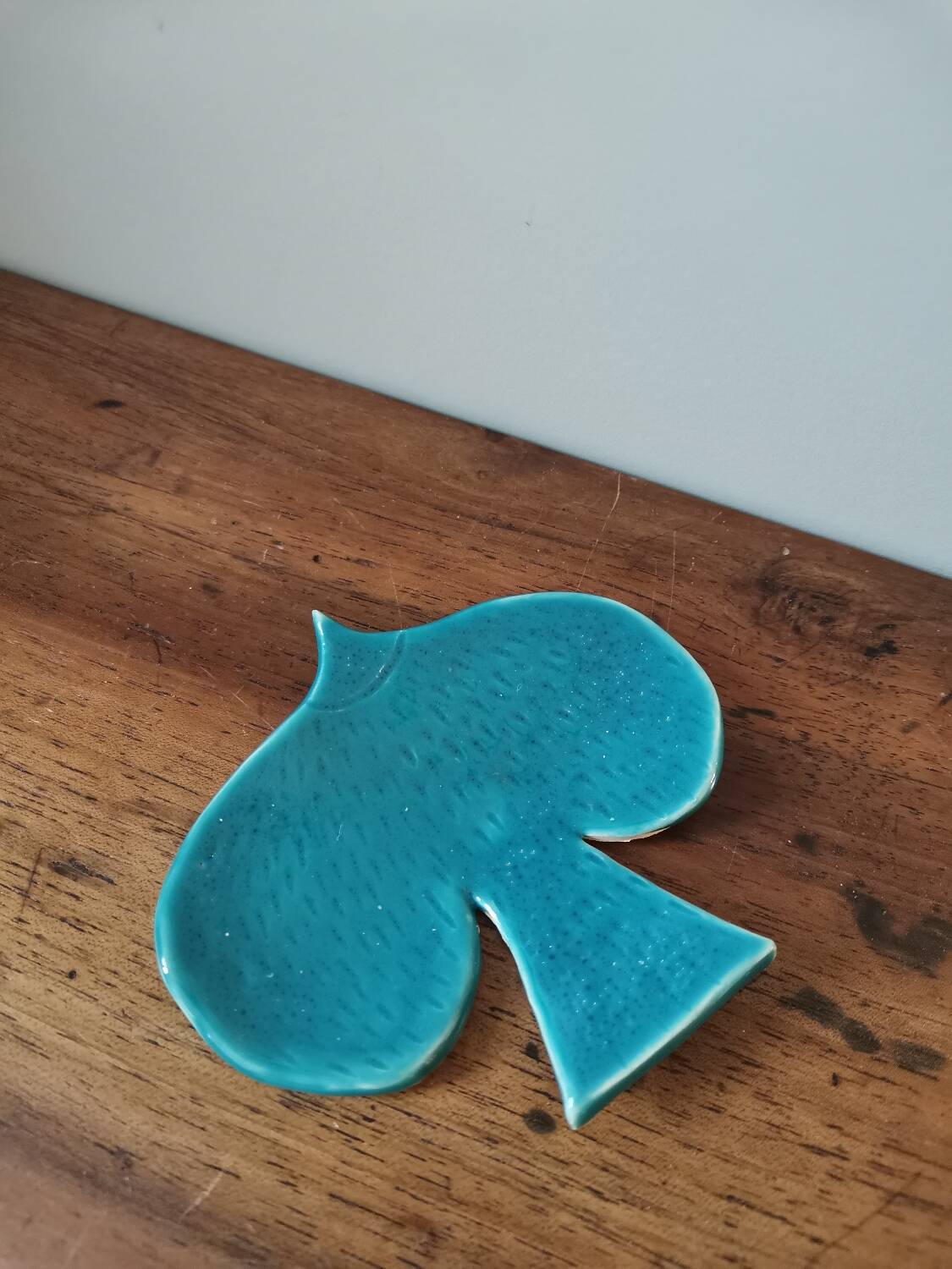 Vintage bowl in the shape of a slightly speckled blue enamelled bird