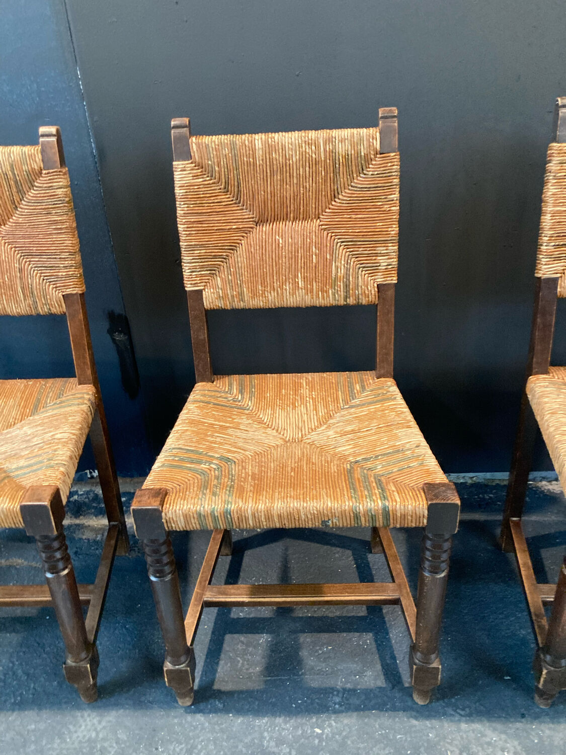 Four straw chairs