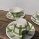 4 coffee cups Green and white checkered wolf grinders