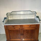 Antique wood and marble kitchen sideboard with carved backsplash