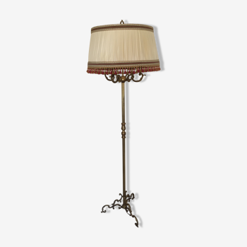 Floor lamp with its golden lampshade