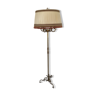 Floor lamp with its golden lampshade
