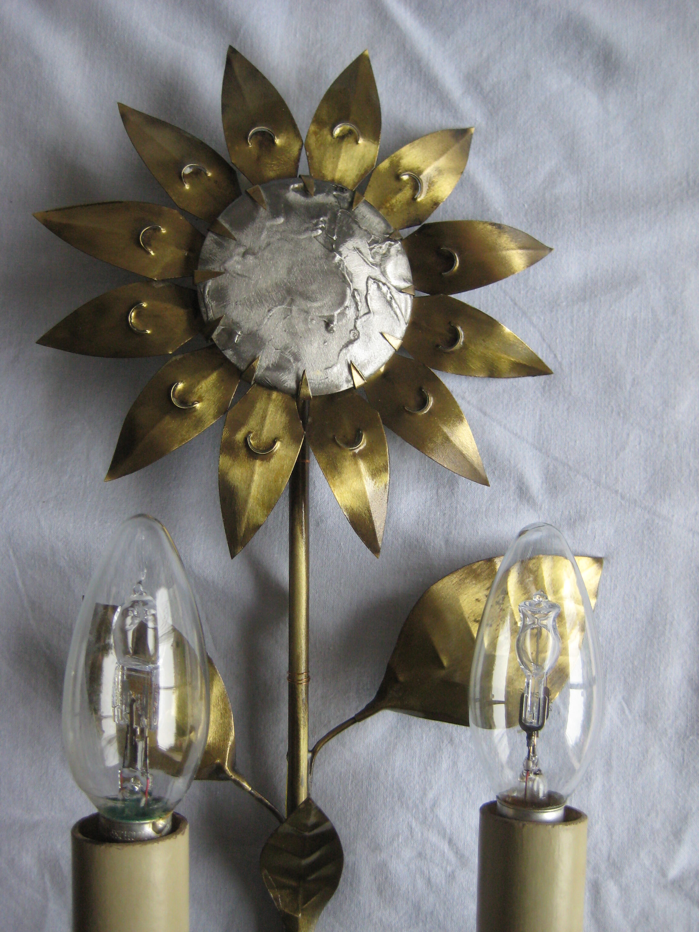 Brass sunflower sconces